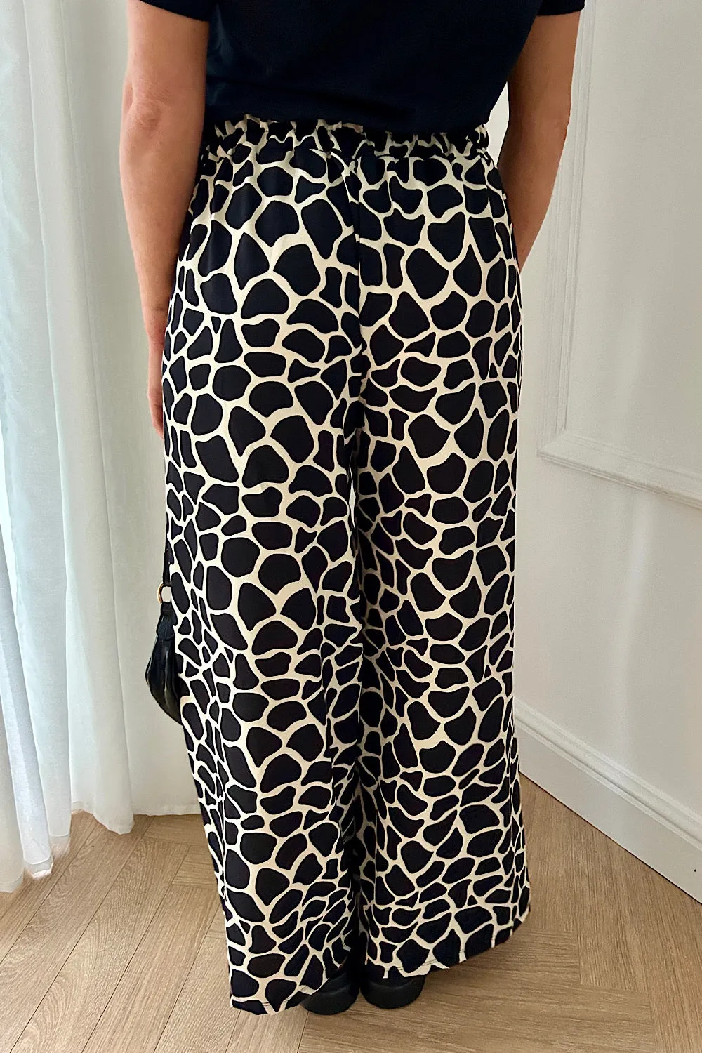 Shannon Black Giraffe Print Flared Trousers