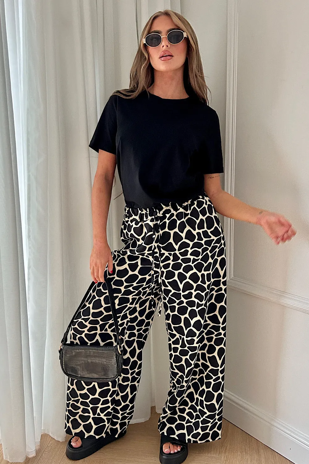 Shannon Black Giraffe Print Flared Trousers