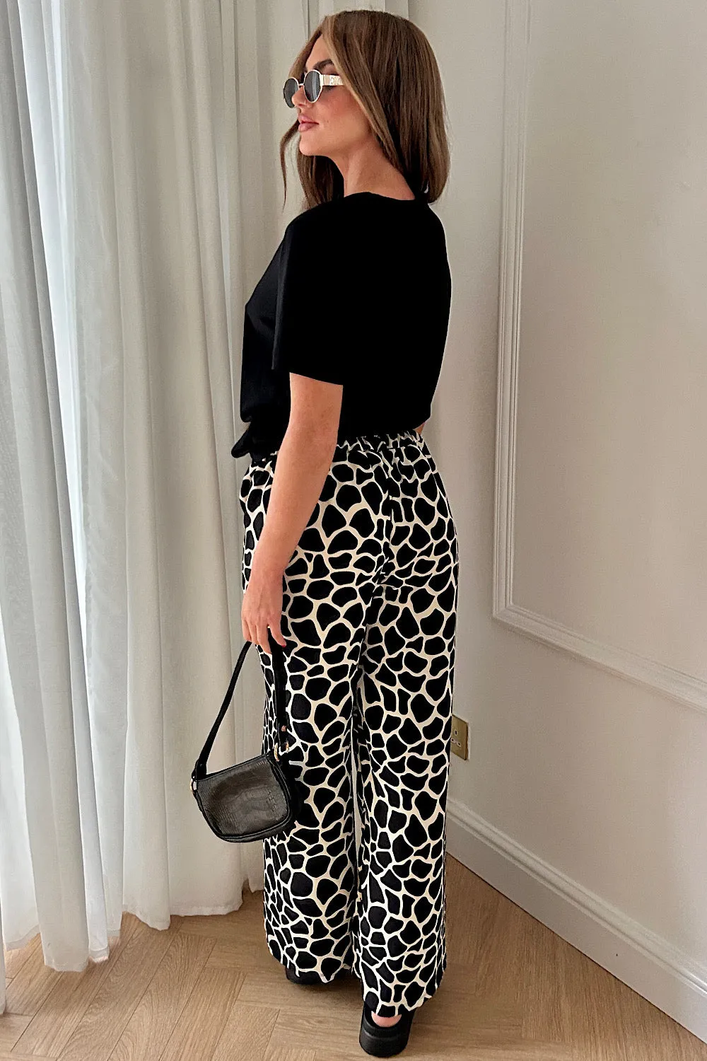 Shannon Black Giraffe Print Flared Trousers